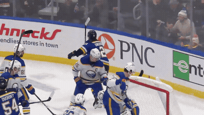 Hockey Game In Front Of PNC Sign GIF