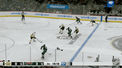 Hockey Game In Front Of Progressive Banner GIF