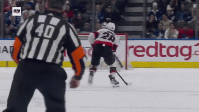 Hockey Game In Front Of Redtag.com Ad GIF