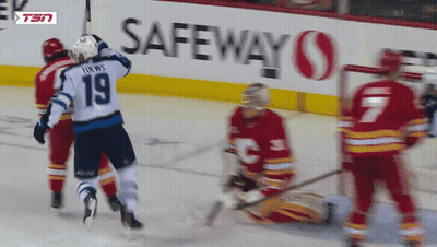 Hockey Game In Front Of Safeway Ad GIF