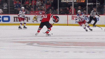 Hockey Game In Front Of Score Bet Sign GIF
