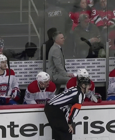 Hockey Game In Front Of Security Sign GIF