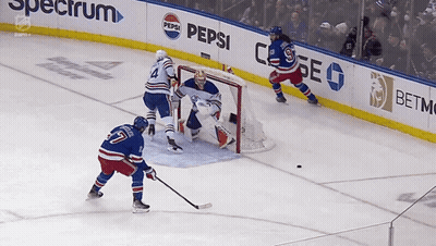 Hockey Game In Front Of Spectrum Ad GIF