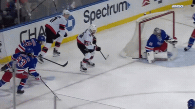 Hockey Game In Front Of Spectrum Ad GIF