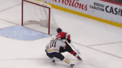 Hockey Game In Front Of Suitex Sign GIF