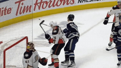 Hockey Game In Front Of Tim Hortons Ad GIF