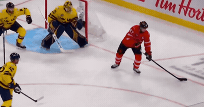 Hockey Game In Front Of Tim Hortons GIF