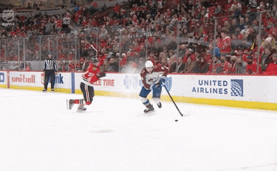 Hockey Game in Front of Toyota Banner