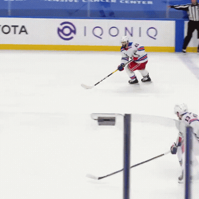 Hockey Game In Front Of Toyota Sign GIF
