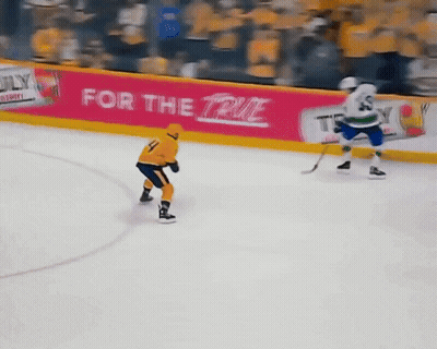 Hockey Game In Front Of True Sign GIF