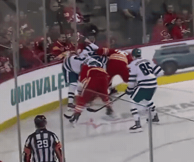 Hockey Game In Front Of Unrivaled Sign GIF
