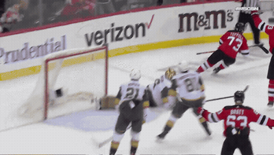 Hockey Game In Front Of Verizon Ad GIF