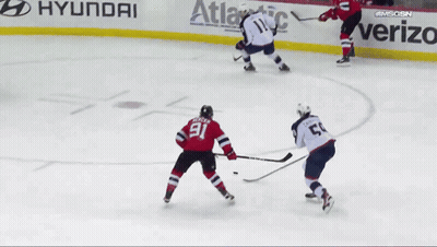 Hockey Game in Front of Verizon Ad