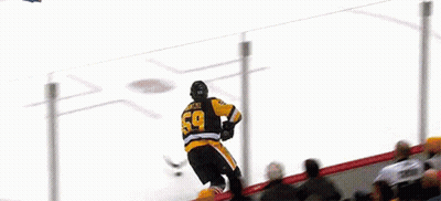 Hockey Game In Front Of Verizon Banner GIF