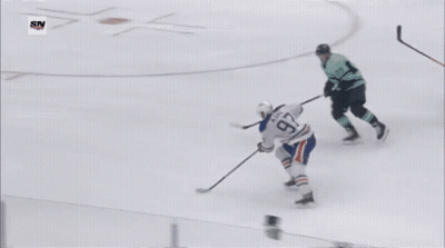 Hockey Game In Front Of Wafd Bank Wall GIF