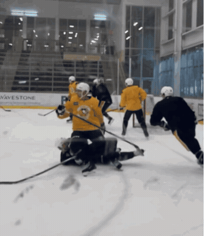 Hockey Game In Front Of Wavestone Sign GIF