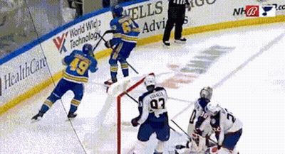 Hockey Game In Front Of Wells Advis Ad GIF