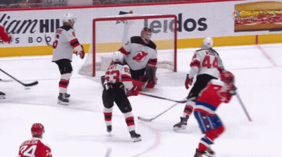 Hockey Game In Front Of William Hill Ad GIF