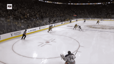 Hockey Game In Stadium Sponsored By Yamaha And Geico GIF