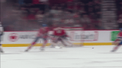 Hockey Game In Stadium With Canadian Tire Ad GIF