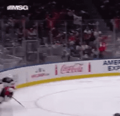 Hockey Game In Stadium With Coca Cola Sign GIF