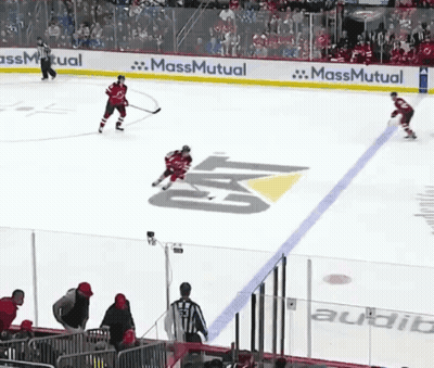 Hockey Game In Stadium With MassMutual Ads GIF