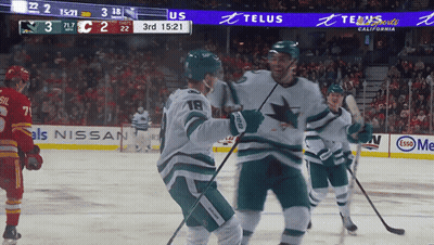 Hockey Game In Stadium With Telus Ad GIF