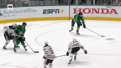 Hockey Game On Ice Rink With Honda ESPN And Baylor Scott & White Ads GIF