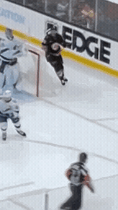 Hockey Game On Rink With Edge Banner GIF