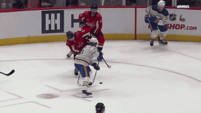Hockey Game On Rink With Shop.com Ad GIF