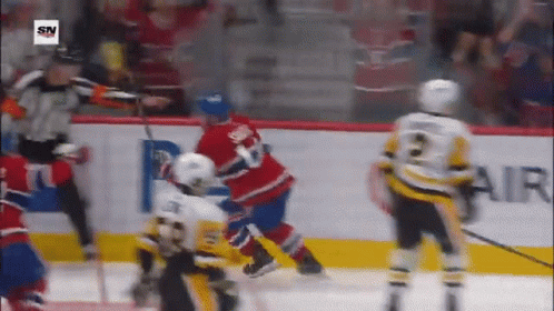Hockey Game Played In Front Of Air Banner GIF