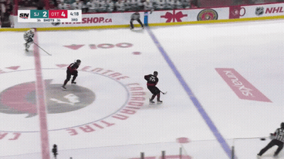 Hockey Game Underway With NHLShop.ca Ice Ad GIF