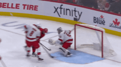 Hockey Game With Belle Tire Banner GIF