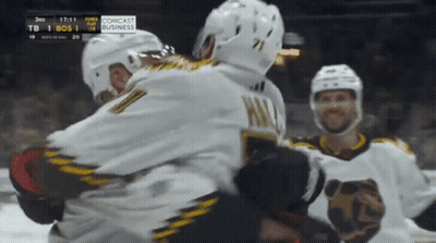 Hockey Game With Comcast Business Scoreboard Ads GIF
