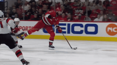Hockey Game With Eico Sign GIF