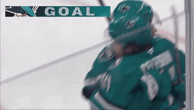 Hockey Game With Goal Displayed On Screen GIF
