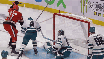 Hockey Game With Monster Energy Sign GIF