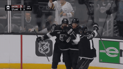 Hockey Game With NHL Logo On Wall GIF
