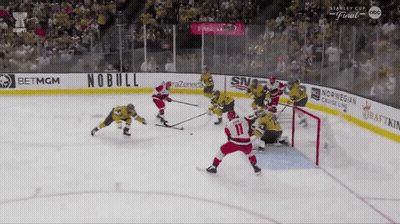 Hockey Game With Norwegian Cruise Line Banner GIF