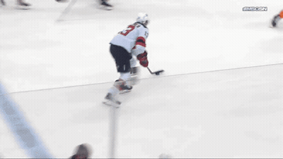 Hockey Goalie In Front Of RWJ Barnabas Health Sign GIF