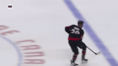 Hockey Goalie In Front Of Tim Hortons Banner GIF