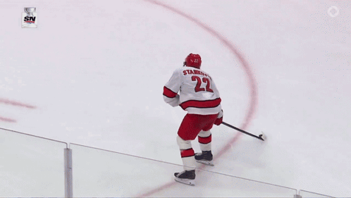 Hockey Goalie Kneeling In Front Of Bauer Net GIF