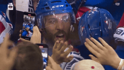 Hockey Goalie Kneeling In Front Of Coors Light Sign GIF