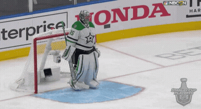 Hockey Goalie On Ice In Front Of Honda Ad GIF