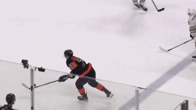 Hockey Goalie With B Jersey In Front Of KDL Ad GIF