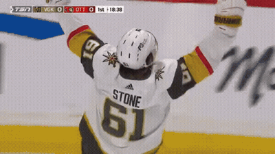 Hockey Player #20 Celebrates With Teammate GIF