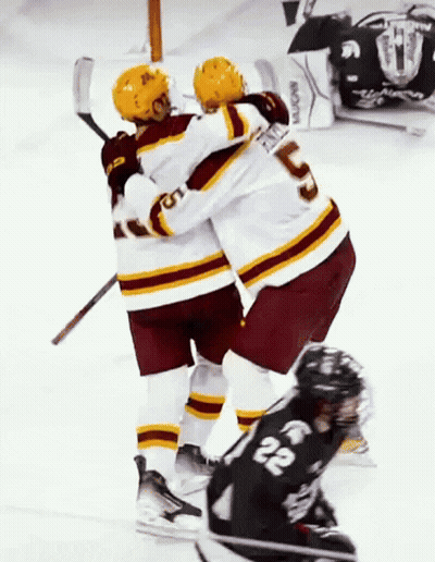 Hockey Player 22 Hugging Another Player GIF