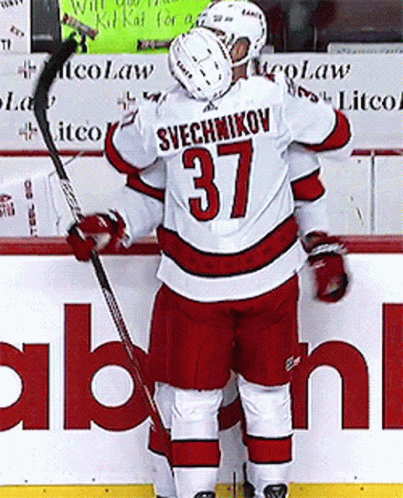 Hockey Player 37 Hugging Another Player GIF