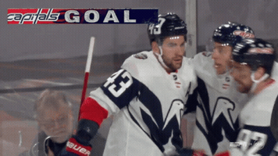 Hockey Player 43 Surrounded By Teammates GIF