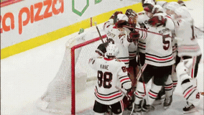 Hockey Player 98 Surrounded By Teammates GIF